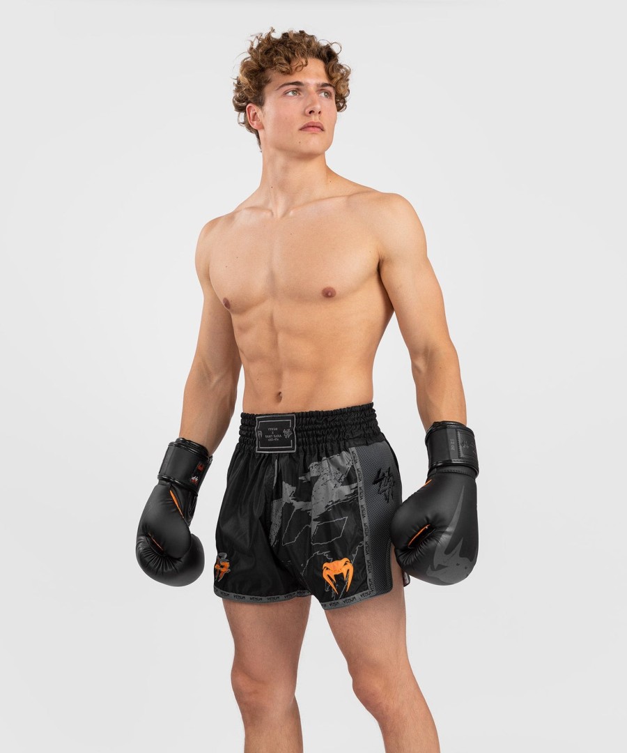 venum s47 muay thaï short - svartoransje