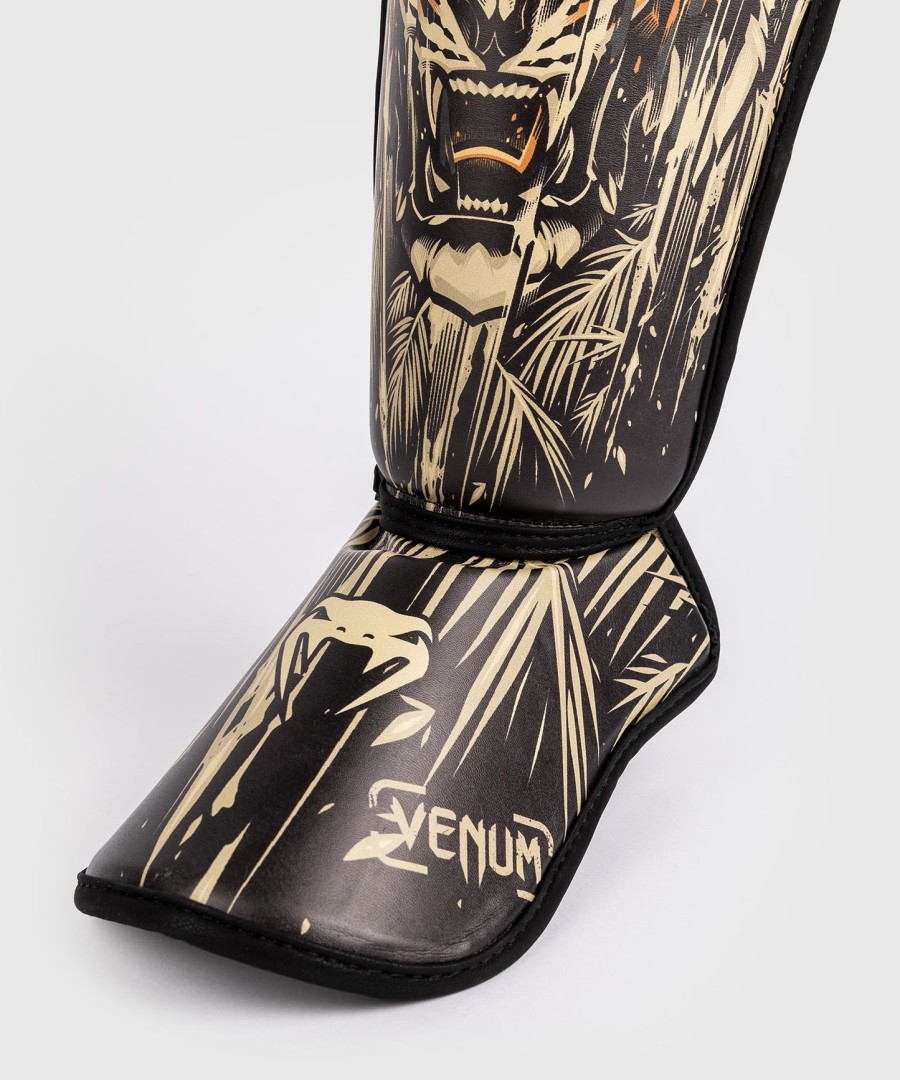 venum tiger leggbeskyttere for barn - svartneon oransje